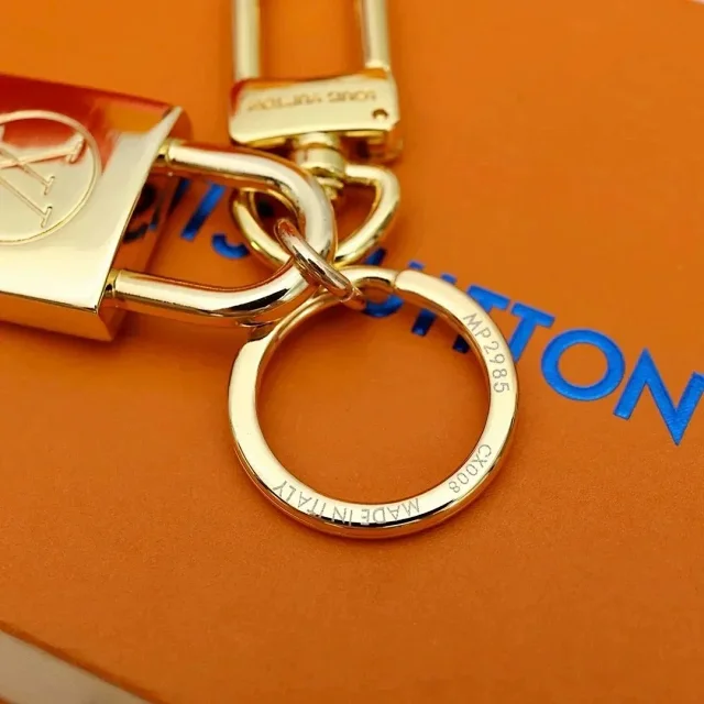 LOUIS VUITTON Lock Keychain [2